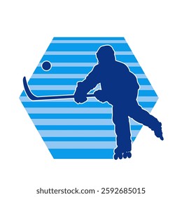 Silhouette of an ice hockey player wearing helmet and uniform carrying hockey stick in action pose