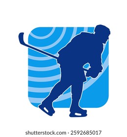 Silhouette of an ice hockey player wearing helmet and uniform carrying hockey stick in action pose