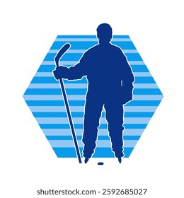 Silhouette of an ice hockey player wearing helmet and uniform carrying hockey stick in action pose