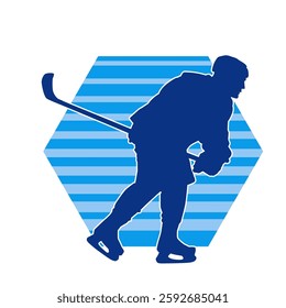 Silhouette of an ice hockey player wearing helmet and uniform carrying hockey stick in action pose