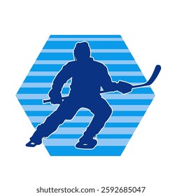 Silhouette of an ice hockey player wearing helmet and uniform carrying hockey stick in action pose