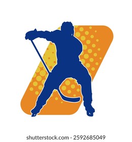 Silhouette of an ice hockey player wearing helmet and uniform carrying hockey stick in action pose