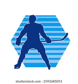 Silhouette of an ice hockey player wearing helmet and uniform carrying hockey stick in action pose