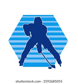 Silhouette of an ice hockey player wearing helmet and uniform carrying hockey stick in action pose