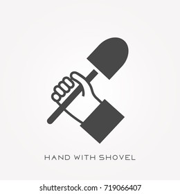 Silhouette icon hand with shovel