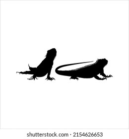 Silhouette of Iguana Reptiles (a genus of herbivorous lizards that are native to tropical areas of Mexico, Central America, South America, and the Caribbean). Vector Illustration 