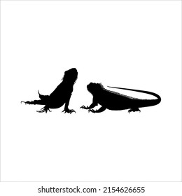 Silhouette of Iguana Reptiles (a genus of herbivorous lizards that are native to tropical areas of Mexico, Central America, South America, and the Caribbean). Vector Illustration 