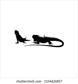 Silhouette of Iguana Reptiles (a genus of herbivorous lizards that are native to tropical areas of Mexico, Central America, South America, and the Caribbean). Vector Illustration 