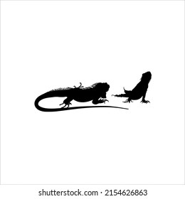 Silhouette of Iguana Reptiles (a genus of herbivorous lizards that are native to tropical areas of Mexico, Central America, South America, and the Caribbean). Vector Illustration 