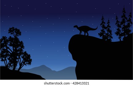 Silhouette of Iguanodon in cliff at the night