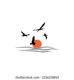 silhouette illustration of birds flying at sunset vector icon