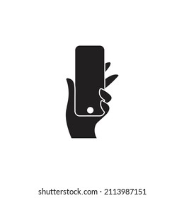 Silhouette illustration of a hand holding a mobile phone for your promotional needs