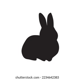 Silhouette illustration of a rabbit in a sitting position