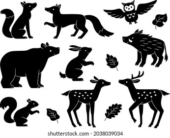 Silhouette illustrations of forest animals and various leaves