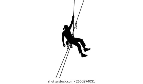 Silhouette of an individual abseiling down a cliff face a challenging extreme sport