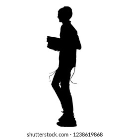 Silhouette of a Jew with a book of Torah. Young Hasid. Orthodoxy is a Jew. Isolated vector illustration. Isolated background. Black on white.