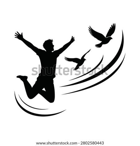 Silhouette of a Joyful Man Jumping with Flying Birds