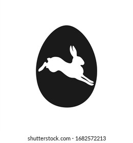 silhouette of jumping and running Easter Bunny in Easter egg. holiday greeting card, vector illustration