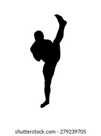 Silhouette of a kickbox fighter delivering a high kick