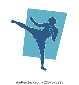 Silhouette of a kickboxing athlete in action pose. Silhouette of a muay thai martial art person in fighting pose.