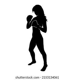 silhouette of a kickboxing woman