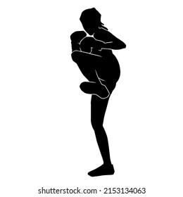 silhouette of a kickboxing woman