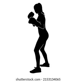 silueta de una mujer kickboxing