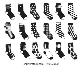 Silhouette of kids socks with different patterns. Vector monochrome illustrations isolate. Set of black white socks garment