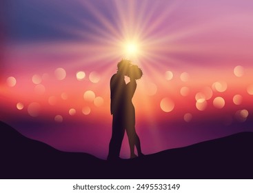 Silhouette of a kissing couple on a defocussed sunset background 