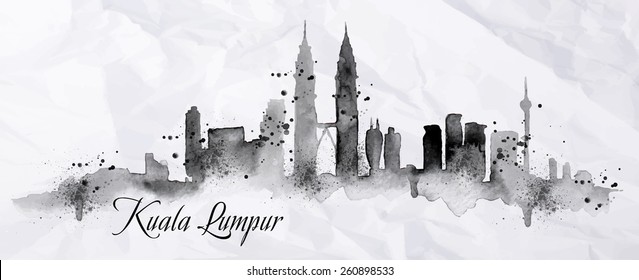 Silhouette of Kuala Lumpur city painted with splashes of ink drops streaks landmarks drawing in black ink on crumpled paper