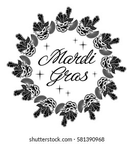 Silhouette label with carnival mask and artistic written text "Mardi Gras". Vector clip art.