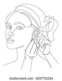 Silhouette of a lady. A woman wears an earring in a modern style with one solid line and leaves. Sketches for decor, posters, stickers, logo. Vector illustration.