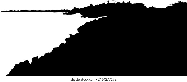 A silhouette of a lagoon with rock damn.
