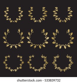 Silhouette laurel and oak wreaths in different  shapes in gold color on black background