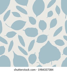Silhouette of leaves vector in blue on a grey background.