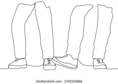 silhouette the legs two people in trousers  one person stepping the other foot  The concept playing between friends  rivalry  meanness  business competition  stepping someone's foot 