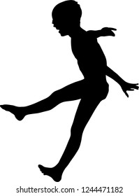Silhouette of a little boy jumping