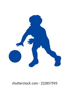 Silhouette of little boy playing with ball
