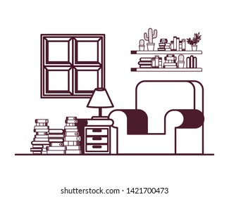 silhouette of living room with couch and stack of books