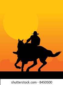 Silhouette of a lone rider against a sunset background
