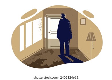 Silhouette lonely man standing in abandoned room and in need of social adaptation after bankruptcy or release from prison. Lonely human experiences apathy and despair due to psychological devastation