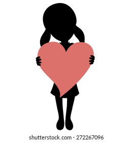Silhouette of a lovely little girl holding a big pink heart