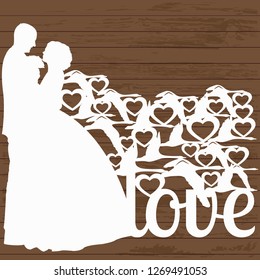 silhouette of a loving couple on a background of flying swans