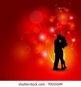 Silhouette of a loving couple on a decorative background