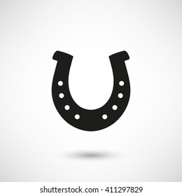 silhouette lucky horseshoe - black vector  icon with shadow