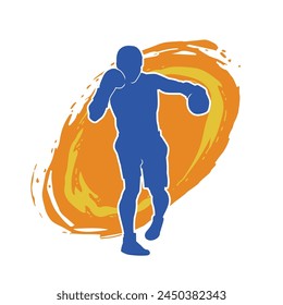 Silhouette of male boxing athlete in action pose. Silhouette of a muscular man wearing boxing gloves for boxing sport.