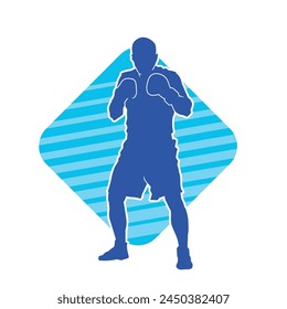 Silhouette of male boxing athlete in action pose. Silhouette of a muscular man wearing boxing gloves for boxing sport.