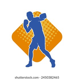 Silhouette of male boxing athlete in action pose. Silhouette of a muscular man wearing boxing gloves for boxing sport.