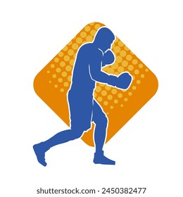 Silhouette of male boxing athlete in action pose. Silhouette of a muscular man wearing boxing gloves for boxing sport.