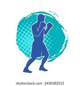 Silhouette of male boxing athlete in action pose. Silhouette of a muscular man wearing boxing gloves for boxing sport.